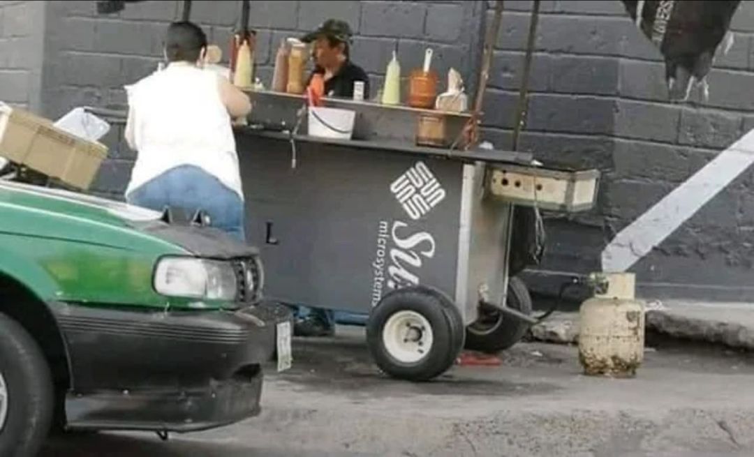 Okay, here's an analysis of the image, broken down into the requested sections. I'll note if a particular theoretical lens *doesn't* strongly apply, as some are less relevant than others. ## Visual Description The pho...