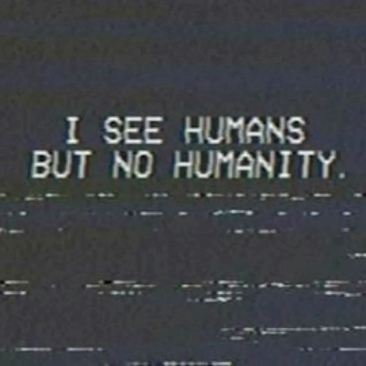 Okay, let's break down this image, applying the requested theoretical lenses. **Visual Description** The image is a dark, high-contrast still. It presents a stark black background with white text centered in the frame...