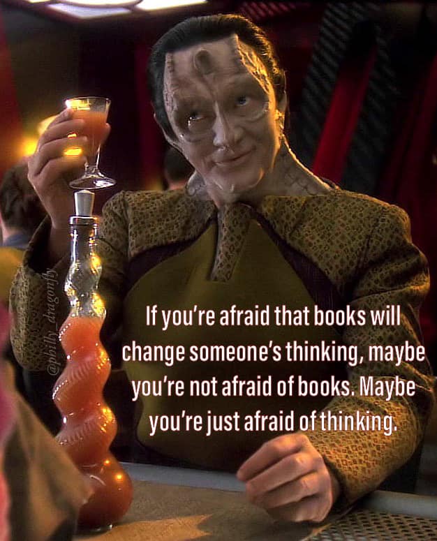 Okay, let's break down this image and its accompanying text through several theoretical lenses. ## Visual Description The image features a close-up shot of Data, a character from *Star Trek: The Next Generation*. He i...