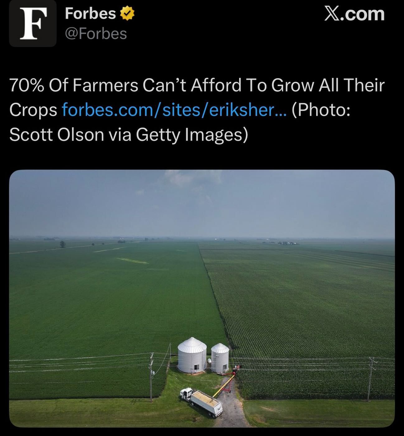 The meme points to a headline from Forbes stating that "70% Of Farmers Can’t Afford To Grow All Their Crops," highlighting how debt has crushed the financial stability of American agriculture. It argues that this insu...
