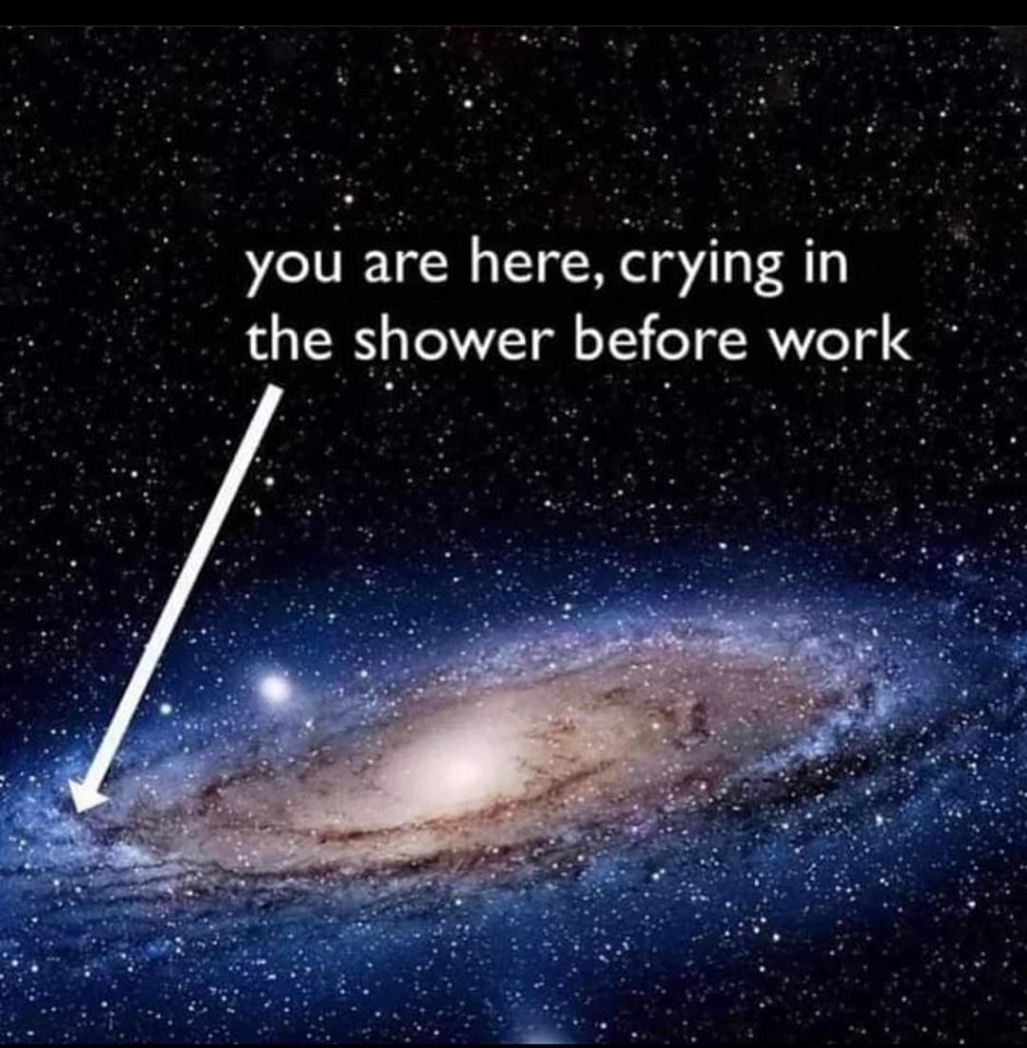 Okay, let's break down this image and the text associated with it through several theoretical lenses. **Visual Description** The image presents a cosmic scene – a wide shot of a spiral galaxy against a backdrop of cou...