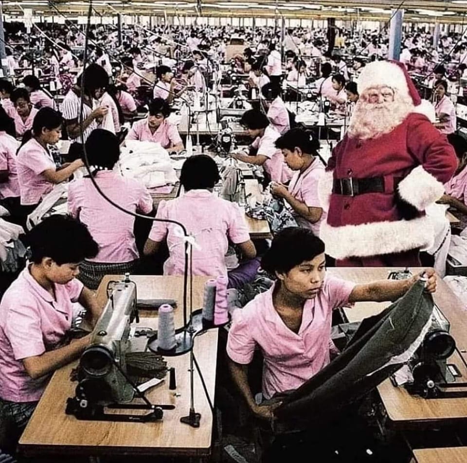 Okay, let's break down this powerful image through several theoretical lenses. **Visual Description** The photograph depicts a vast factory interior, filled with rows upon rows of workers – predominantly women – seate...