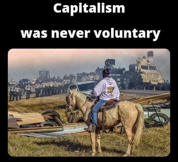 Okay, let's break down this image and its accompanying text ("Capitalism was never voluntary") through the lenses you've provided. **Visual Description** The image depicts a scene seemingly at a protest or occupation....