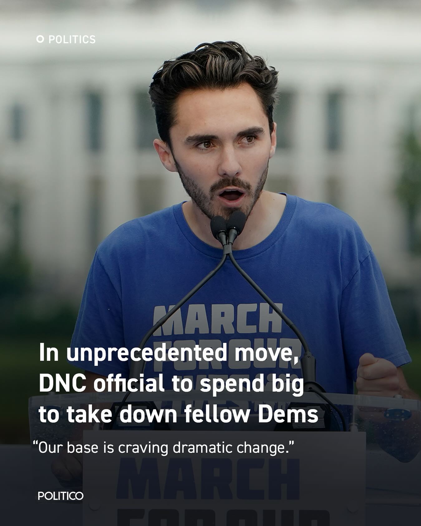 Okay, let's break down this image and its associated text through the requested theoretical lenses. **Visual Description** The image presents a close-up shot of a man speaking into a microphone. He appears to be givin...