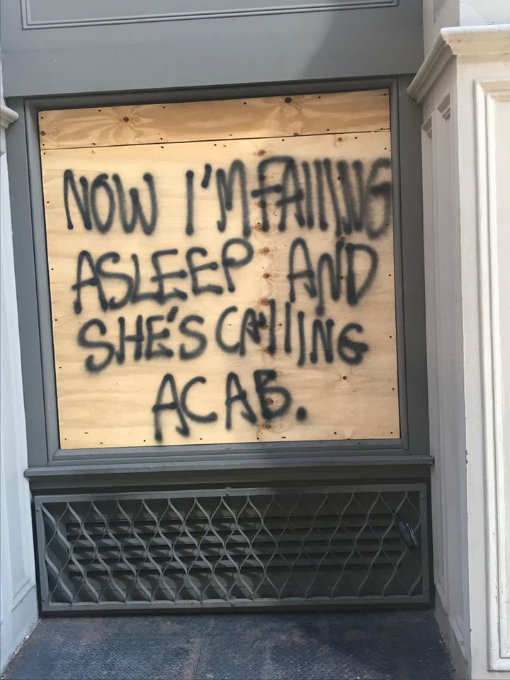 Okay, here's an analysis of the image, broken down into sections as requested. I'll only include the sections that are relevant to the content and context. **Visual Description** The image shows a storefront window th...