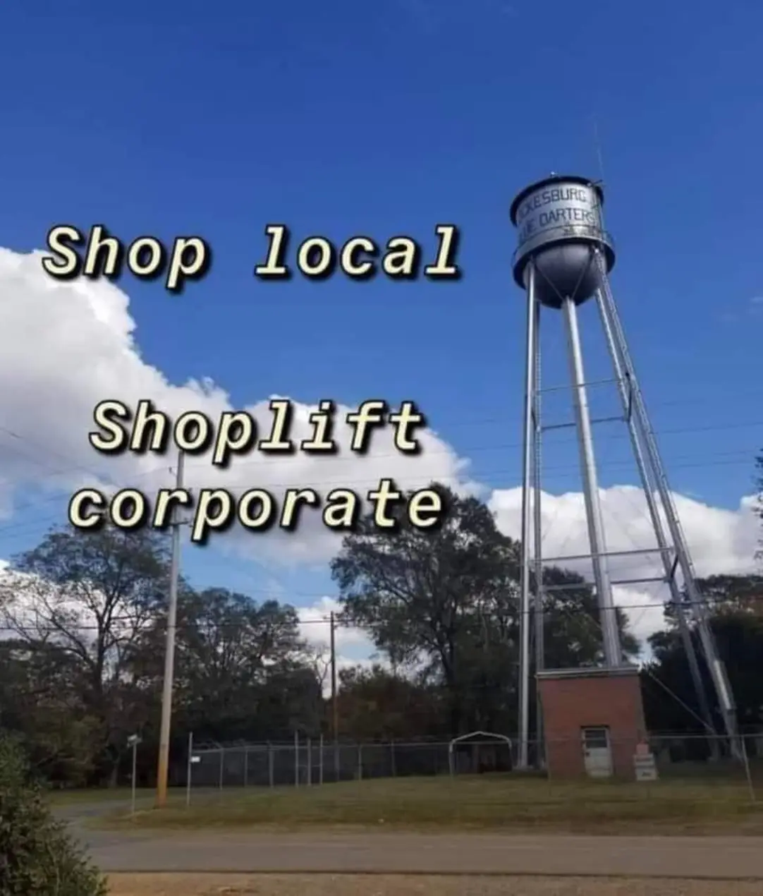 Okay, let's break down this image and its text overlay through the requested theoretical lenses. ## Visual Description The image features a tall, metallic water tower prominently set against a bright blue, cloud-dotte...