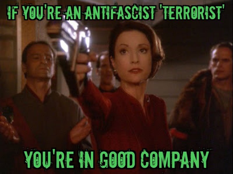 Here's an analysis of the image, broken down into sections as requested, addressing only the sections where applicable. ## Visual Description The image is a still from a film or television show. It depicts a woman, li...