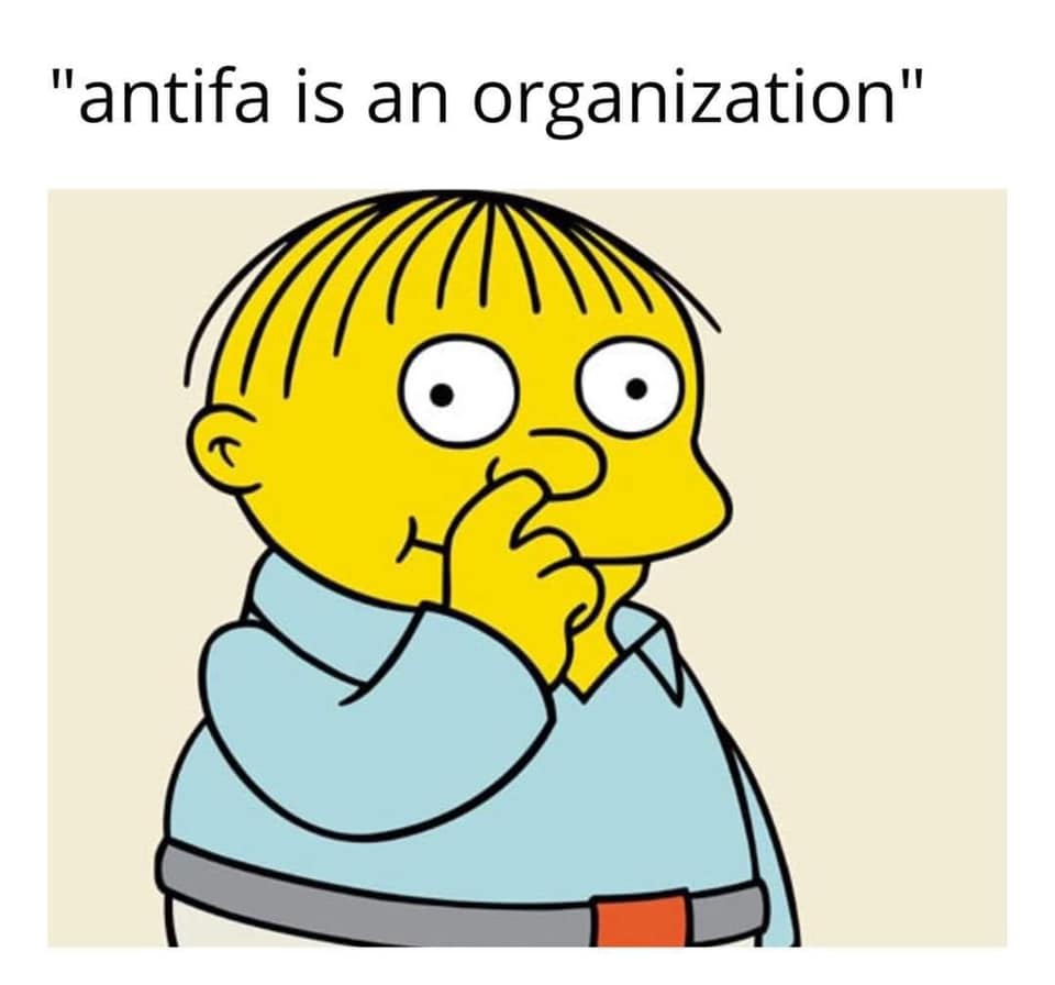 Okay, let's analyze this image and its accompanying text ("antifa is an organization") through the requested theoretical lenses. **Visual Description** The image is a cartoon depiction of Ralph Wiggum, a character fro...