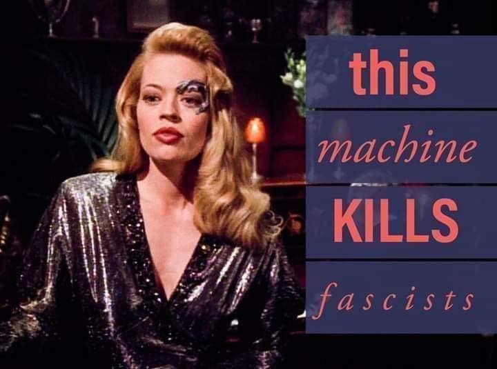 Here's an analysis of the image, broken down into relevant sections based on the theoretical frameworks requested. Given the image's provocative nature, several frameworks readily apply. **Visual Description** The ima...