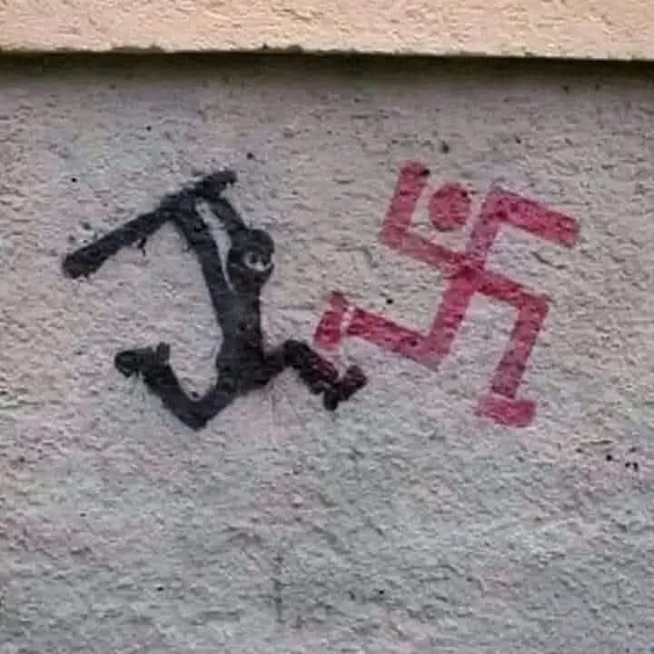 Okay, here's an analysis of the image, broken down into sections as requested. Please be aware that this image contains extremely sensitive and hateful imagery (a swastika), and this analysis is academic in nature. I...