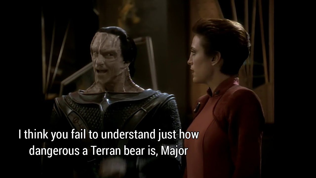 Here’s an analysis of the image and quote, broken down into relevant sections based on the requested theoretical lenses. **Image Overview:** The image is a still from the Star Trek: Voyager episode "Dark Frontier." It...