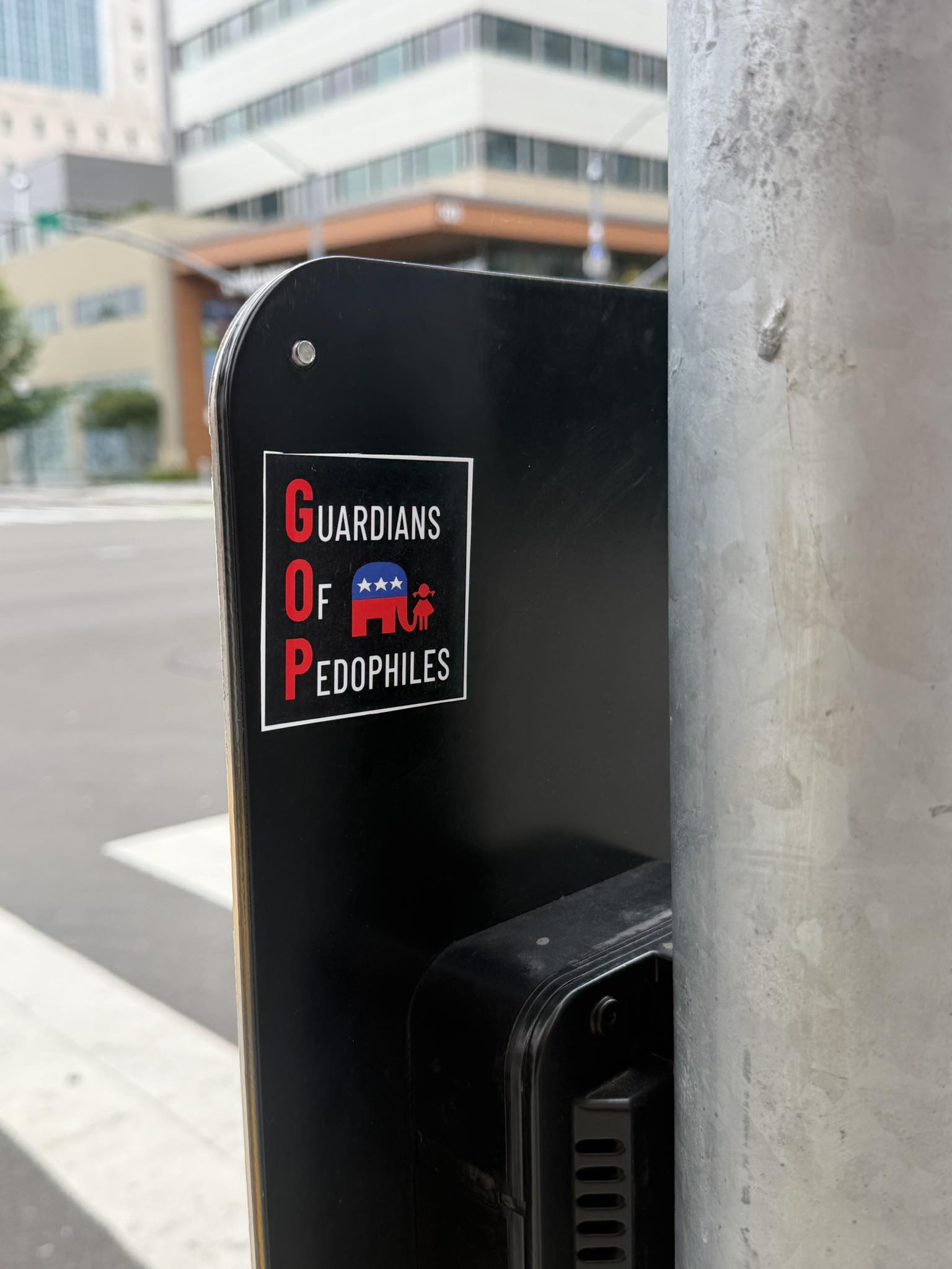 This anti-reactionary joke targets the Grand Old Party (GOP) by ironically labeling it as the "Guardians of Pedophiles." The text on the sticker explicitly states that the Republican elephant logo stands as the protec...