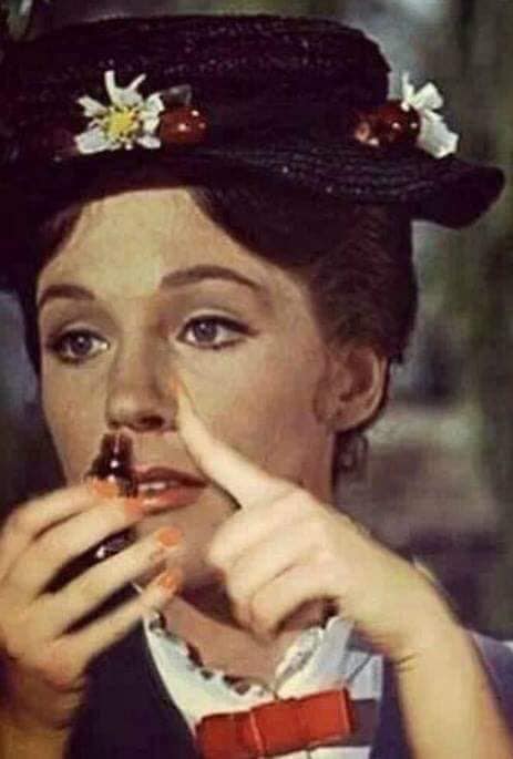 Okay, let's analyze the image of Mary Poppins applying lipstick, using the frameworks you've requested. I will only address the sections that are relevant and applicable to the image and its possible interpretations....