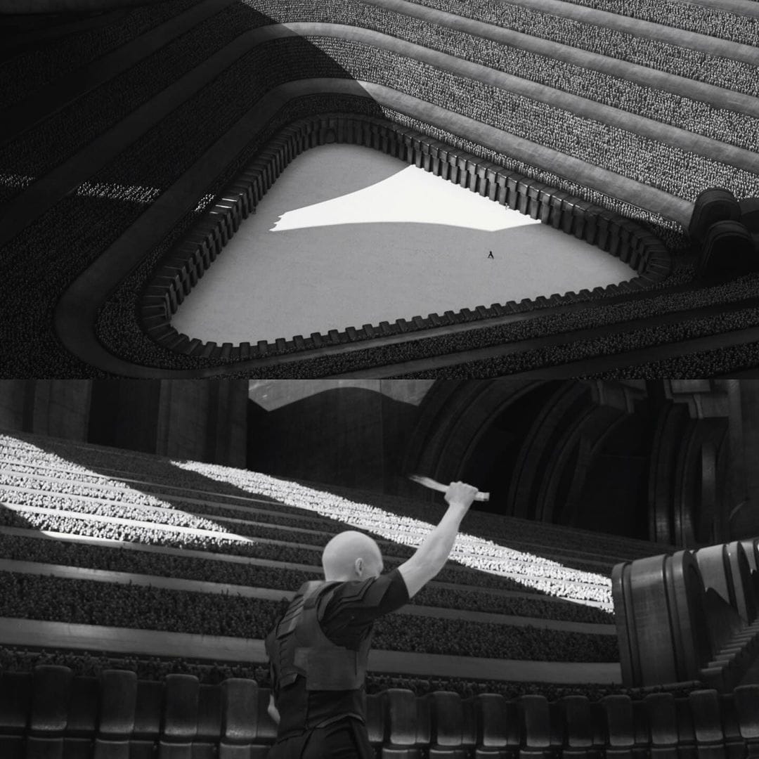 Okay, let's break down this striking photograph with the requested analytical lenses. **Visual Description** The photograph is a high-contrast black and white image of an ornate, grand theater interior. The compositio...
