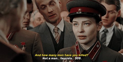 Okay, let's break down this image and the text accompanying it through several theoretical lenses. **Image Description:** The image appears to be a still from a film, likely set in the mid-20th century, based on the c...