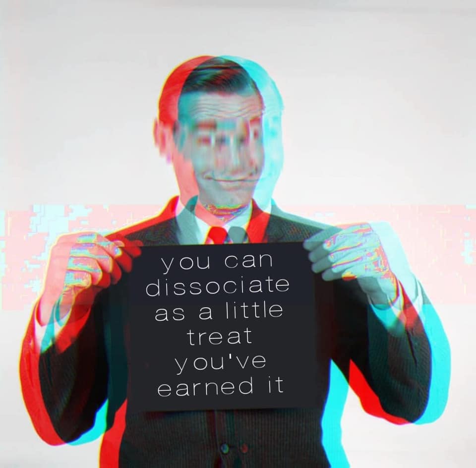 Okay, let's break down this image using the frameworks you've provided. It's rich in potential for several levels of analysis. ## Visual Description The image features a man in a dark suit and white shirt, seemingly i...