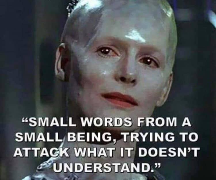 Okay, let's analyze the image and quote through the requested theoretical lenses. **Visual Description** The image features a close-up of the character Agent Smith from *The Matrix*. He is a pale, almost ghostly figur...