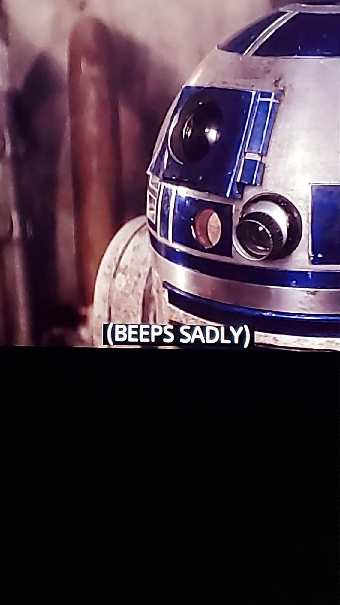 Okay, here's an analysis of the image, broken down by the requested theoretical lenses. Given the image's simplicity, some sections will be brief or non-applicable. **Visual Description** The image depicts R2-D2, the...