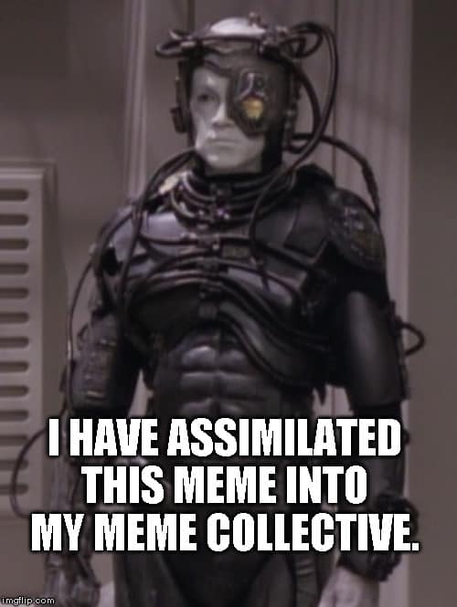 Okay, let's break down this Borg-themed meme through the lenses you've requested. It's a rich image, and a lot can be unpacked. **Visual Description** The image depicts a character in full Borg attire from *Star Trek:...