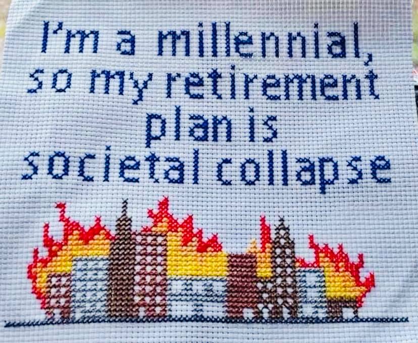 Okay, here’s an analysis of the image, broken down into the requested sections, prioritizing the lenses that seem most applicable. ## Visual Description The image is a cross-stitch embroidery on a light blue fabric ba...