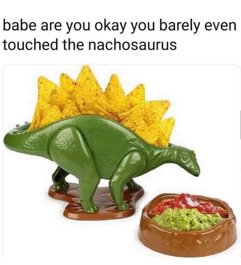 Okay, let's break down this meme through several theoretical lenses. It's a surprisingly rich image for analysis! **Visual Description** The image features a light green, plastic Stegosaurus-shaped serving dish. Trian...