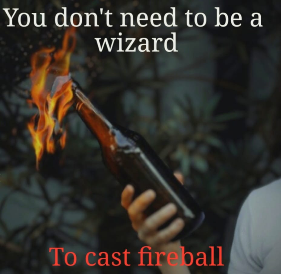 Okay, let's break down this image and its associated text ("You don't need to be a wizard to cast fireball") through the requested theoretical lenses. **Visual Description** The image shows a person's hand holding a l...