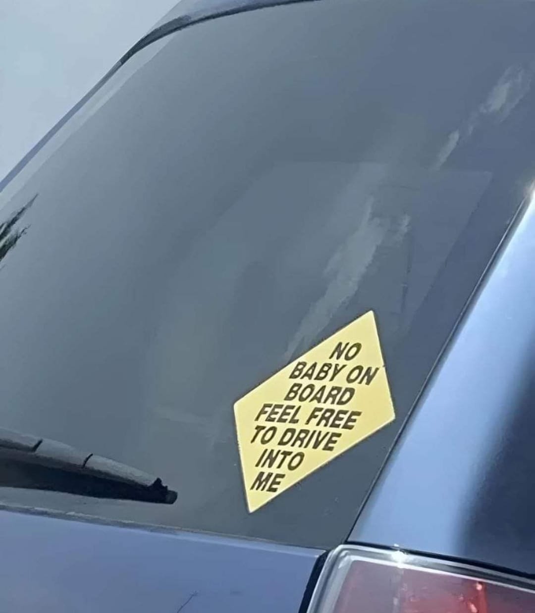 Okay, let's break down the image of the bumper sticker with a multi-layered analysis, employing the lenses you requested. I'll only address categories where the image/text strongly lends itself to that analysis. **1....