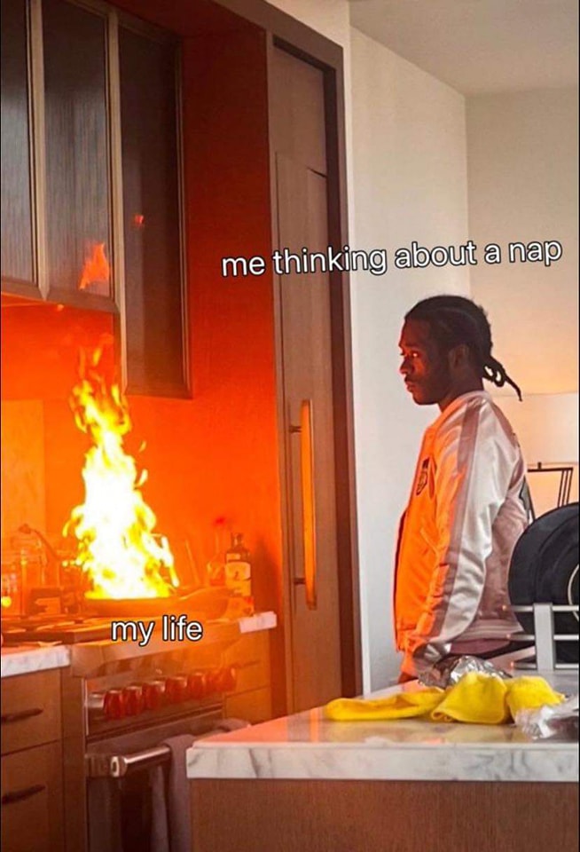 Okay, let's break down this meme using various theoretical lenses. This is a fun image with a lot to unpack! ## Visual Description The image shows a brightly lit kitchen. The focal point is a stove with a vibrant, unc...