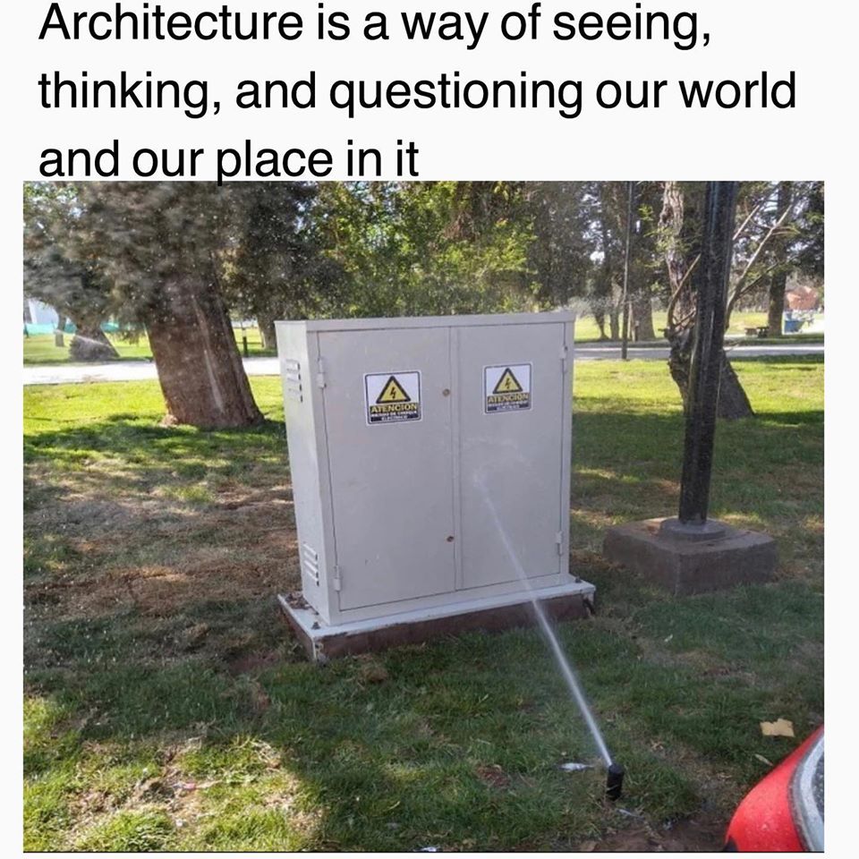 Okay, let's break down this image through several theoretical lenses, as requested. It's a surprisingly rich image, despite its seeming banality! ## Visual Description The image depicts two metal boxes, likely housing...