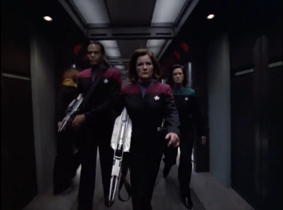 Okay, here's an analysis of the image, broken down into the sections you've requested, addressing each area where relevant. It's worth noting that interpreting a still image within the context of the *Star Trek* unive...