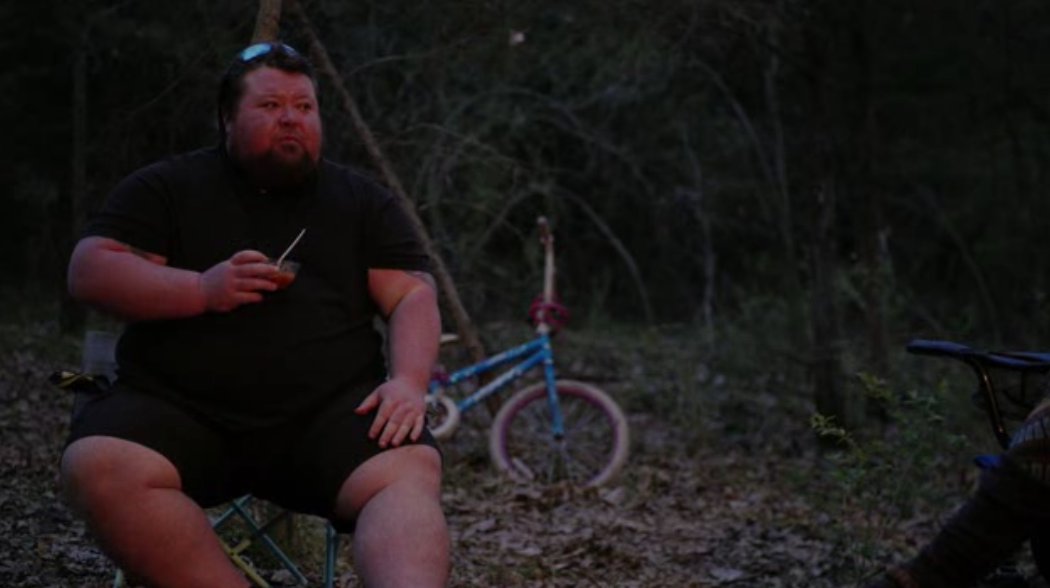 Okay, let's break down this image through a few critical lenses. It's important to note that these analyses are interpretations, and the image can support multiple readings. ## Visual Description The image depicts a h...