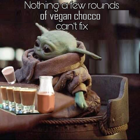 Okay, let's analyze this image of Grogu (Baby Yoda) enjoying chocolate beverages through the lenses you've requested. I'll provide sections only where the chosen theoretical framework applies meaningfully. **Visual De...