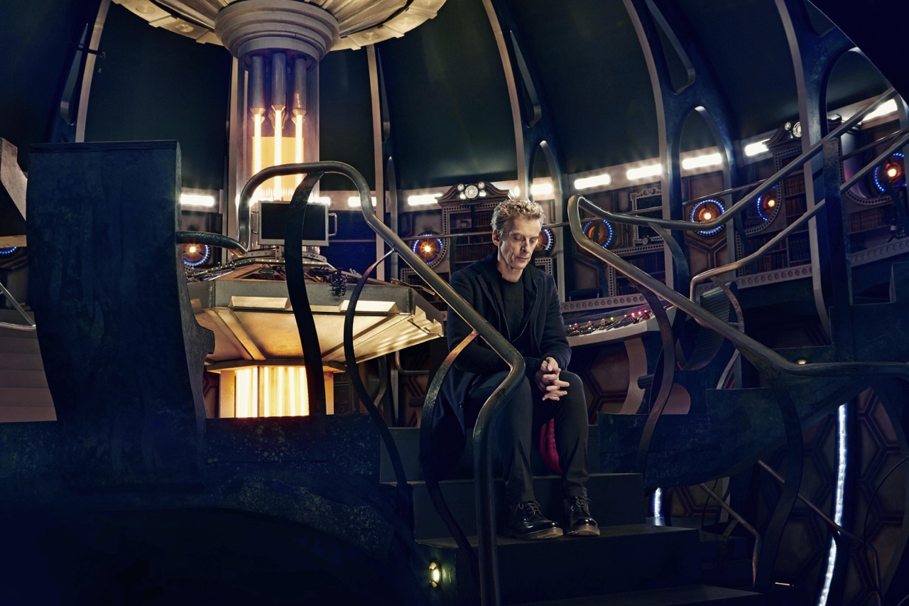 Okay, here’s an analysis of the image, broken down into the requested theoretical frameworks, applied where relevant. I'll indicate if a section isn't applicable. ## Visual Description The image depicts Peter Capaldi...
