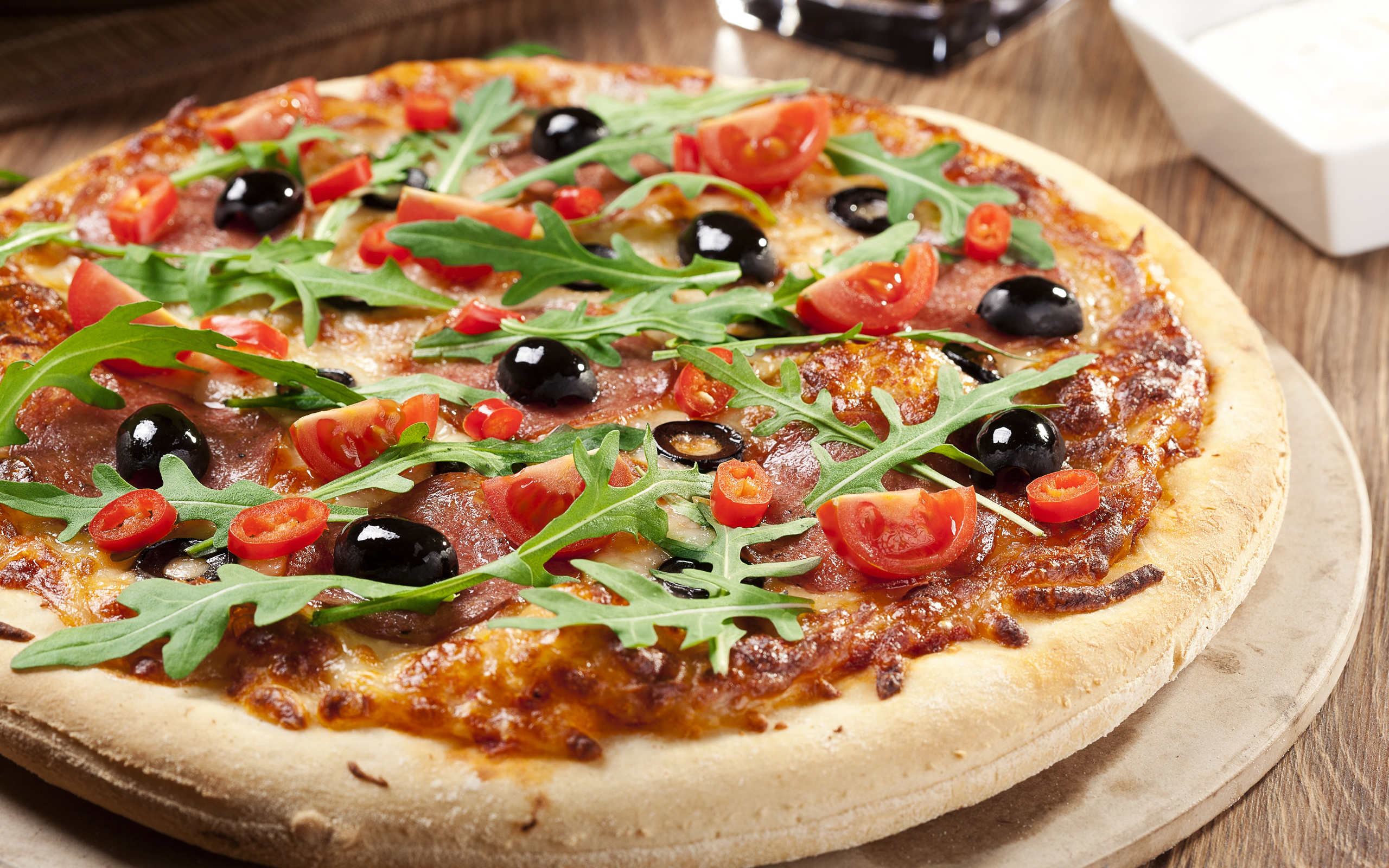 Okay, here's an analysis of the image of the pizza, broken down into sections addressing the requested theoretical frameworks, only where applicable. Given the nature of the image, some frameworks won't be a strong fi...