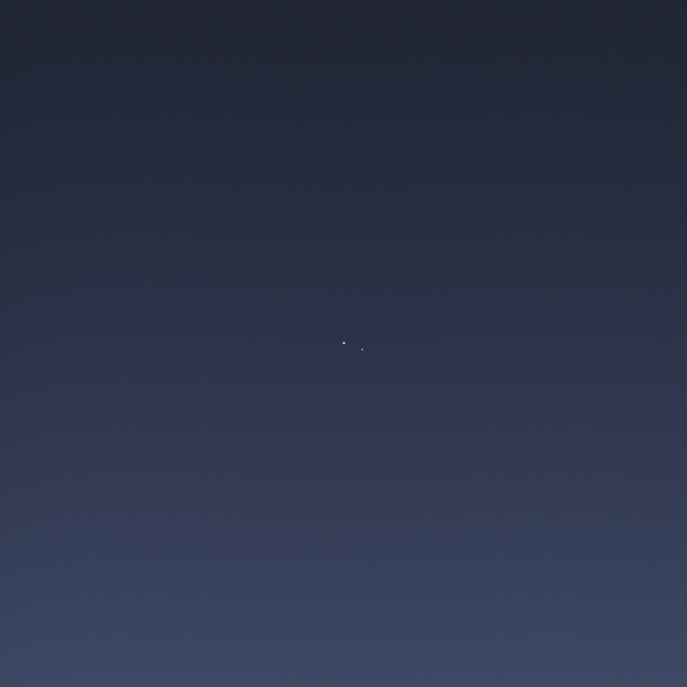 Okay, let's analyze the image through several theoretical lenses, as requested. ## Visual Description The image is overwhelmingly dark, a deep indigo or navy blue. The majority of the frame is uniformly colored, creat...