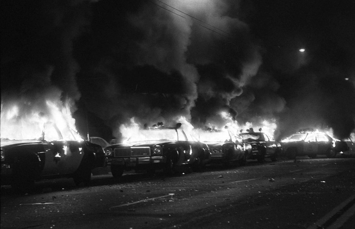 Okay, let's analyze this powerful image using the frameworks you've requested. Given the subject matter, several of these frameworks will be highly applicable, while others will have limited relevance. I will organize...