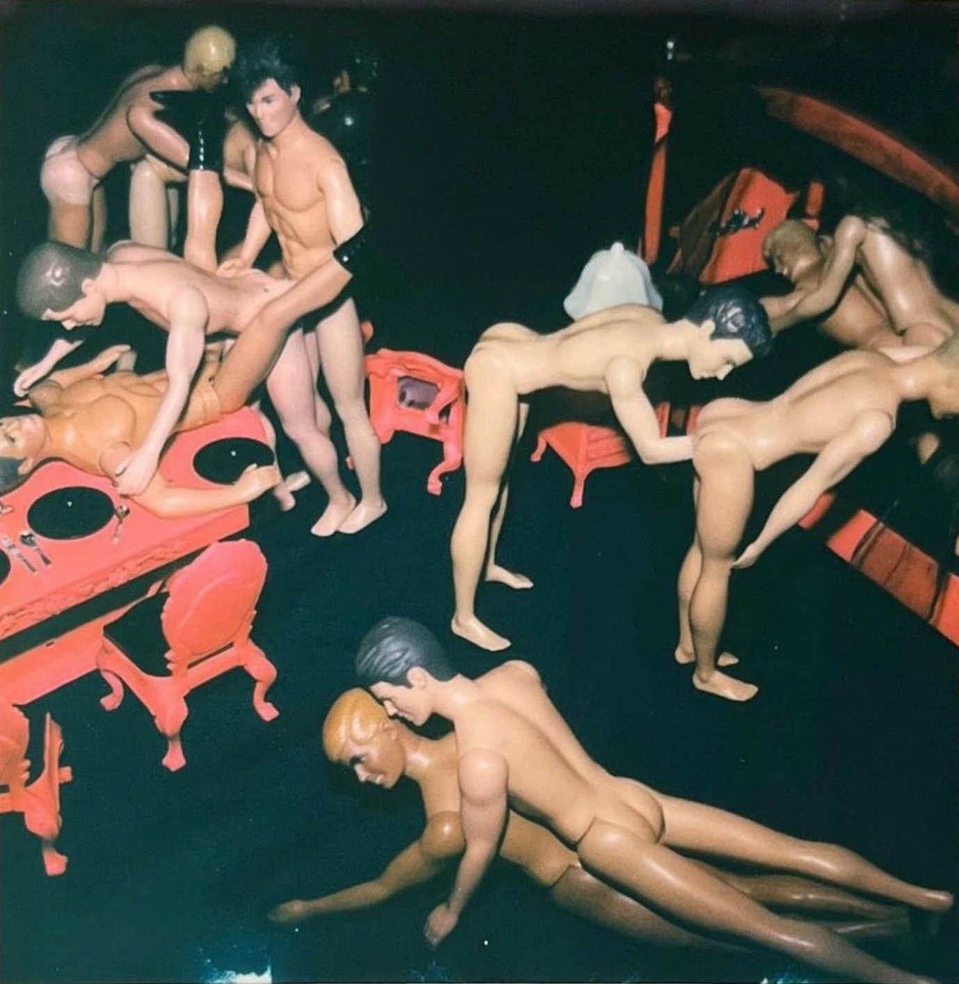 Okay, let's break down this image through several theoretical lenses. It's important to note that interpretation is subjective, and different scholars might emphasize different aspects. I will provide what I see as re...