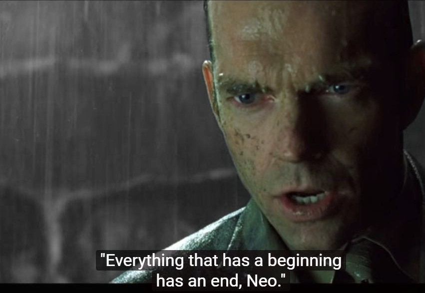 Okay, let's break down the image and the quote ("Everything that has a beginning has an end, Neo.") using the requested theoretical lenses. ## Visual Description The image is a close-up shot of the character Cypher (p...