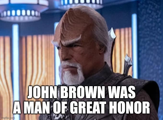 Okay, let's break down this meme through the lenses you've requested. Here's an analysis section by section, only including the headings that apply given the content. **Visual Description** The image features a close-...