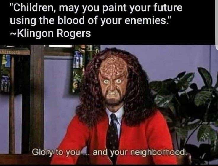 Okay, let's break down this image/meme through the lenses of various theoretical frameworks. It's a rich example, given the bizarre juxtaposition of Mr. Rogers and Klingon imagery. **Visual Description** The image is...