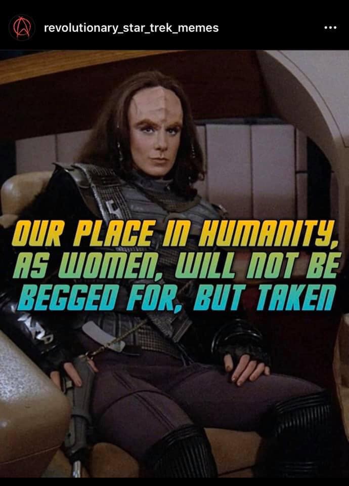 Okay, here's an analysis of the image, broken down into the requested sections. I will only include sections where the content is applicable. **Visual Description** The image is a still from *Star Trek: The Next Gener...