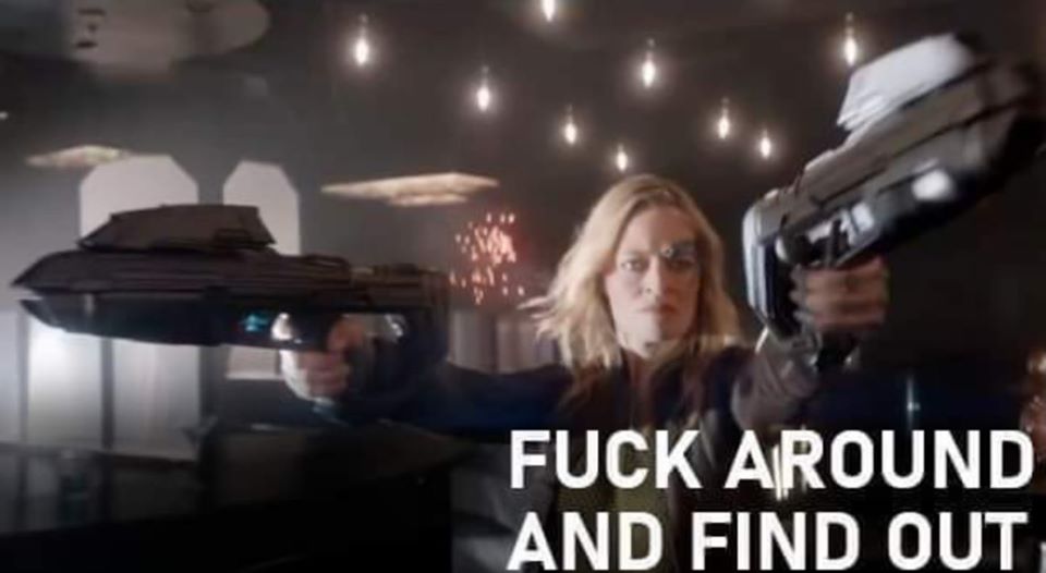 Okay, let's break down the image based on the requested analytical lenses. **Visual Description** The image appears to be a still from a science fiction, or potentially thriller, film or television series. It's a medi...