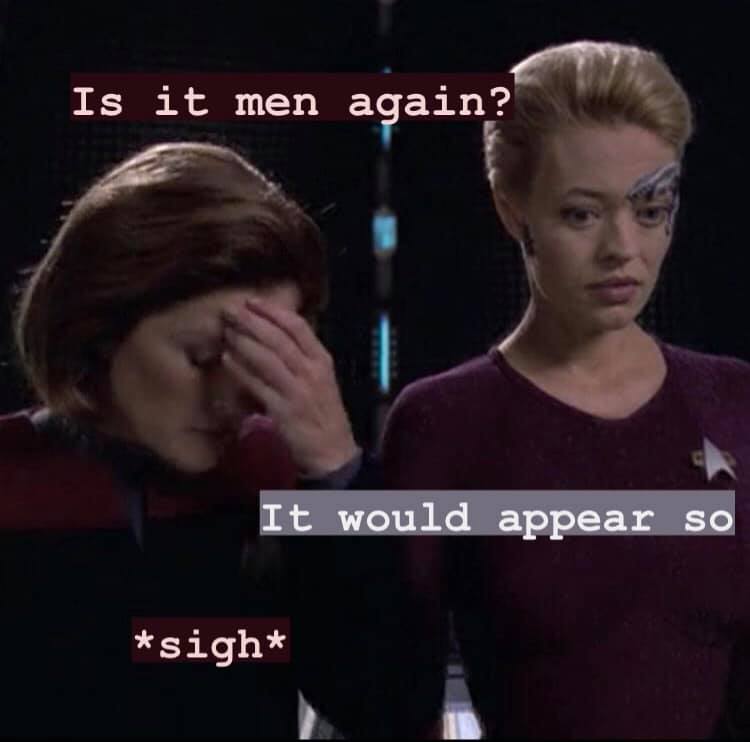 Okay, let's break down this meme, applying relevant theoretical lenses. **Visual Description** The image is a screenshot from *Star Trek: Voyager*. It depicts two female characters: Captain Kathryn Janeway (Kate Mulgr...