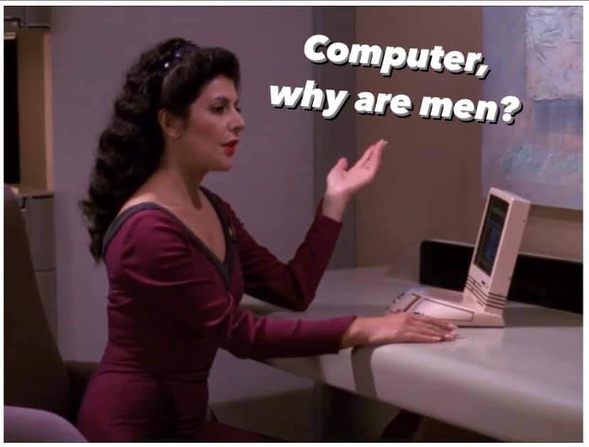 Okay, let's break down this image, which is a still from *Star Trek: The Next Generation* with a humorous overlay of text, through the lens of various theoretical frameworks. **Visual Description** The image depicts D...