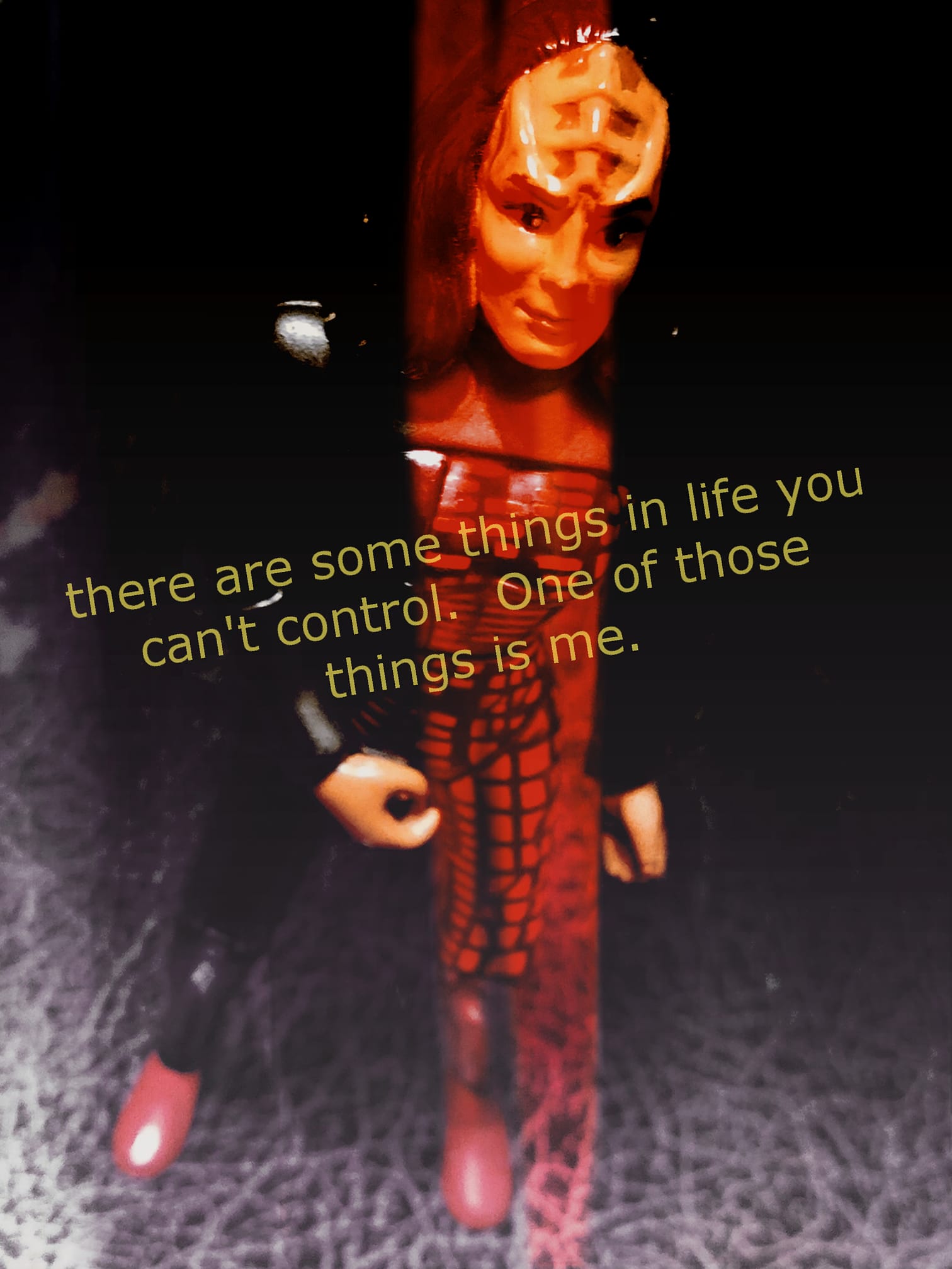 Okay, let's analyze the image using the requested theoretical frameworks. **Visual Description** The image is a close-up, low-resolution, and somewhat distorted photograph of a Barbie doll. The doll is positioned in t...