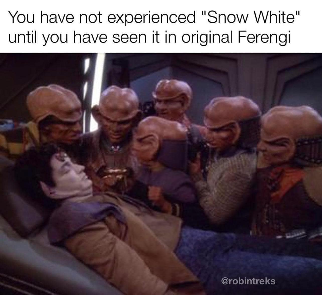 Okay, let's break down this image and the caption "You have not experienced 'Snow White' until you have seen it in original Ferengi" through the lenses you've requested. It's a fun image with potential for surprisingl...