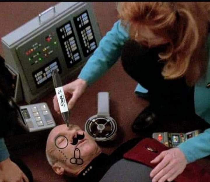 Okay, let's break down this deeply unsettling image from the *Star Trek* episode "The Changeling" through several theoretical lenses. Be warned, the content is disturbing, and the analysis will reflect that. **Visual...