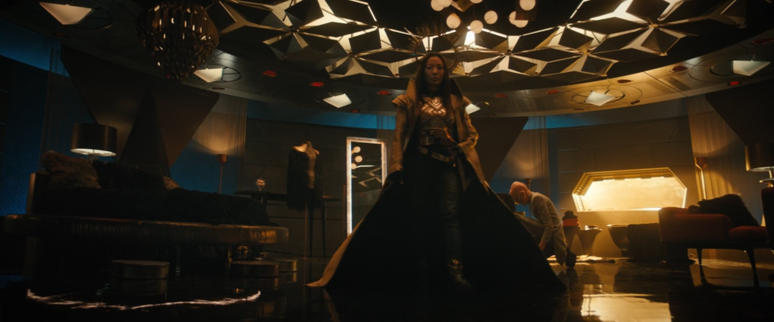 Okay, let's break down this striking image using the frameworks you've provided. It's a complex scene with rich visual cues that lend themselves to several interpretive layers. **Visual Description** The image present...