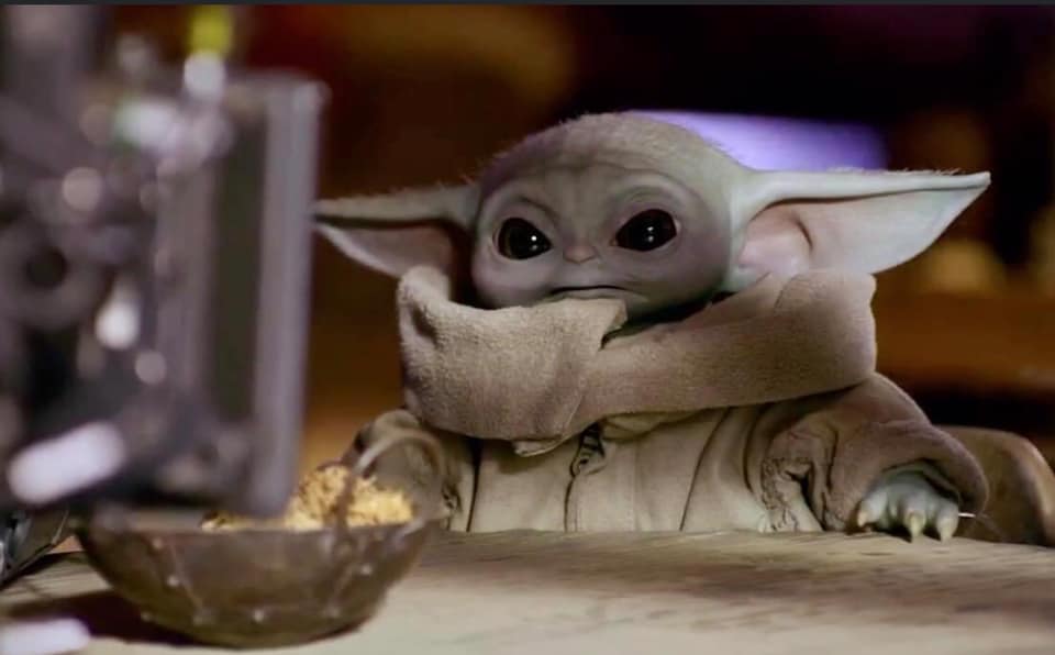 Okay, let's break down this iconic image of "Baby Yoda" (Grogu) from *The Mandalorian* through several theoretical lenses. ## **Visual Description** The image depicts Grogu, a character from the *Star Wars* universe,...