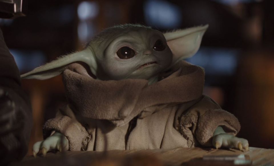 Okay, here’s an analysis of the image of “Baby Yoda” (Grogu) from *The Mandalorian*, broken down into the requested theoretical frameworks. I'll indicate where a section doesn't strongly apply. It's important to note...